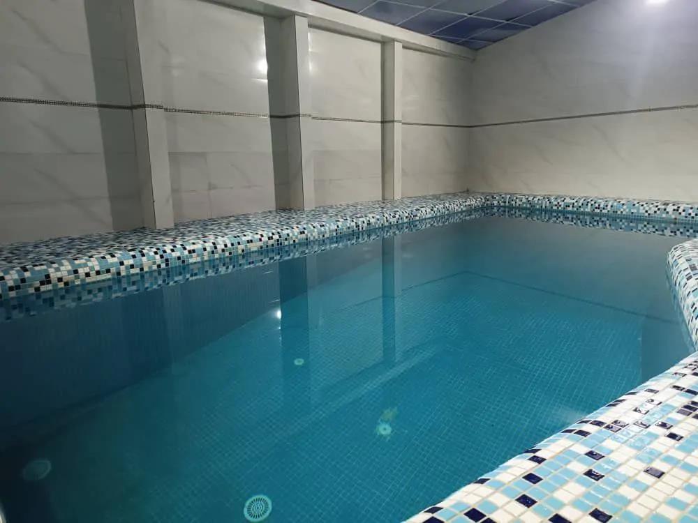 کلبه سوییسی استخردار آبگرم  ارالیا شیرود